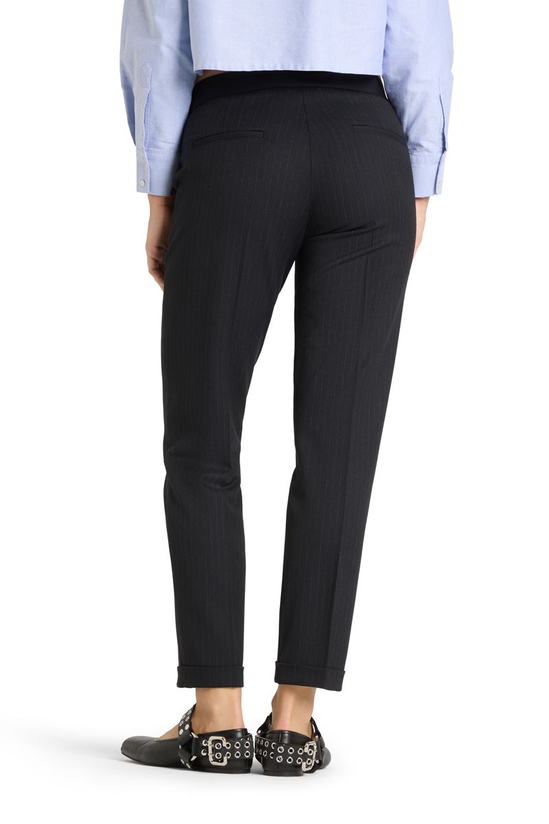 Stoffhose Kim, Cambio